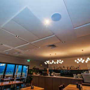 Ceiling acoustic panels installed in a cafe